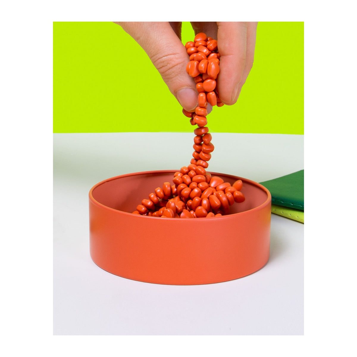 Crags - Magnetic Fidget Putty - Matte Coral (Orange) — in use