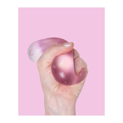 Gump - The Memory Gel Stress Ball - Moon Jelly (Pink) — in use